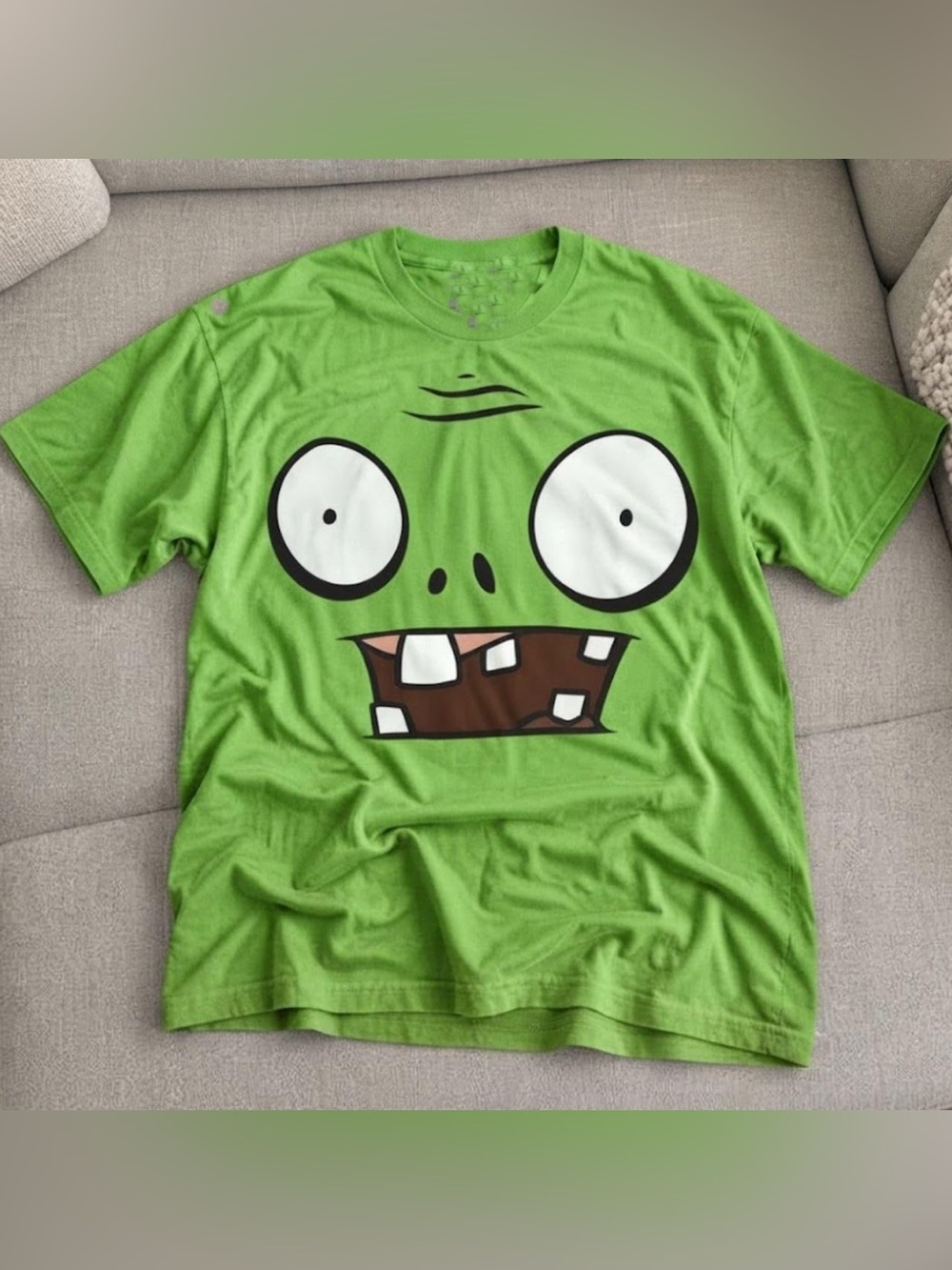 Kiwi plants vs zombies face Green Graphic unisex t-shirt